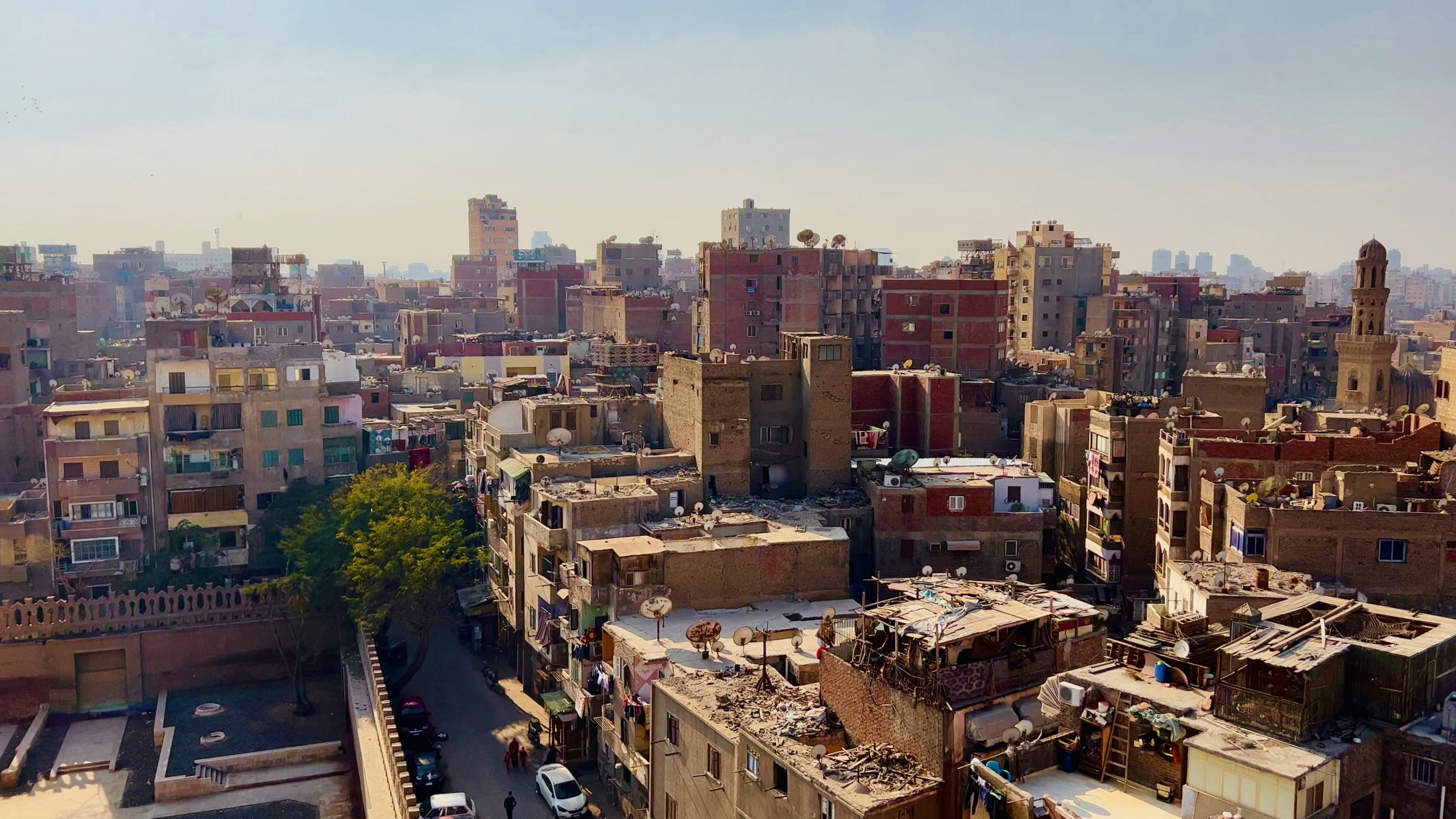 aerial-static-view-brazil-capital-cairo-cityscape-buildings-rooftops-balconies-and-str-SBI-351111763